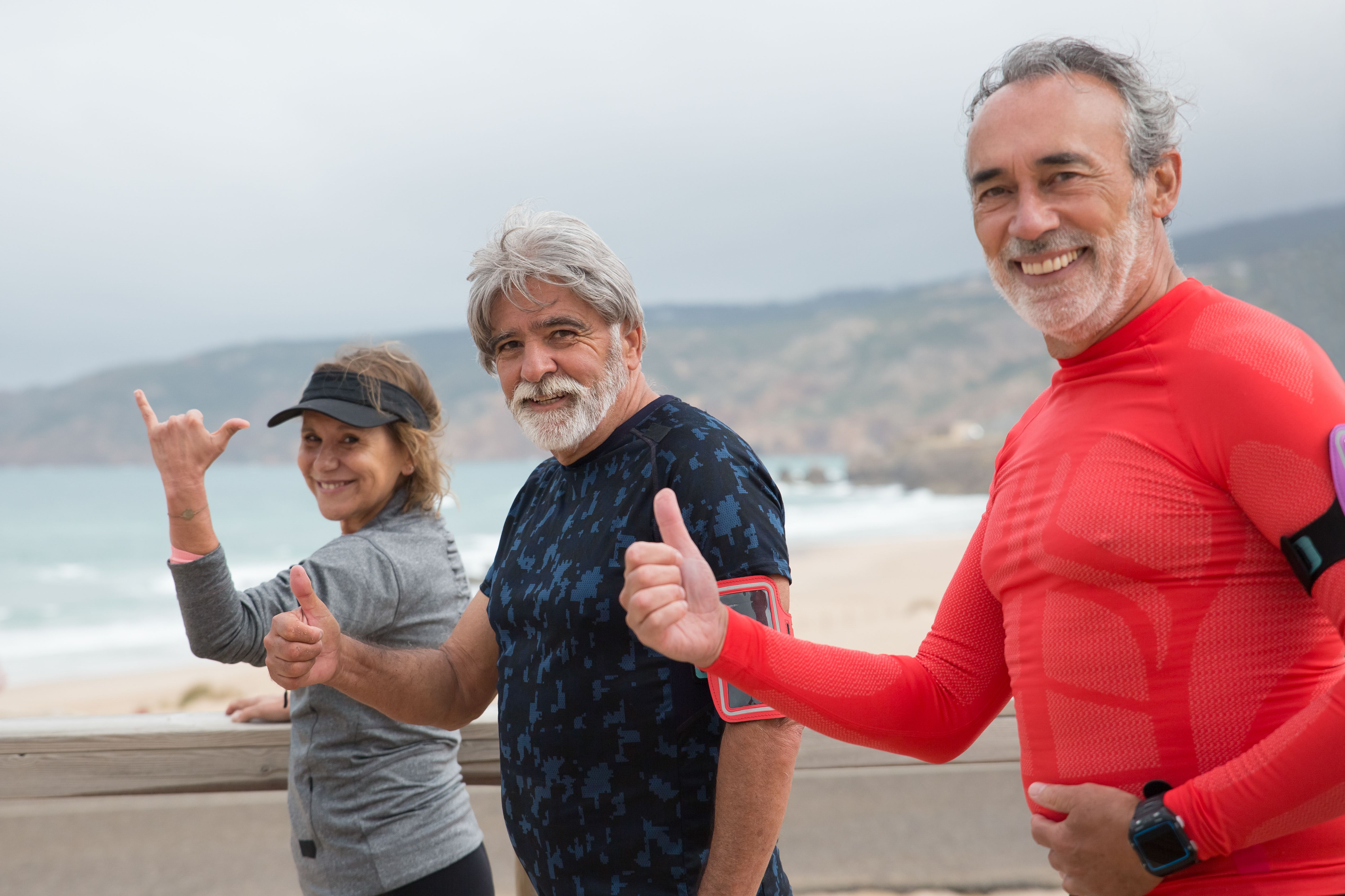 Active older adults smiling together outdoors